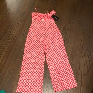 PrettyLittleThing | polkadot Pink tie front Jumpsuit